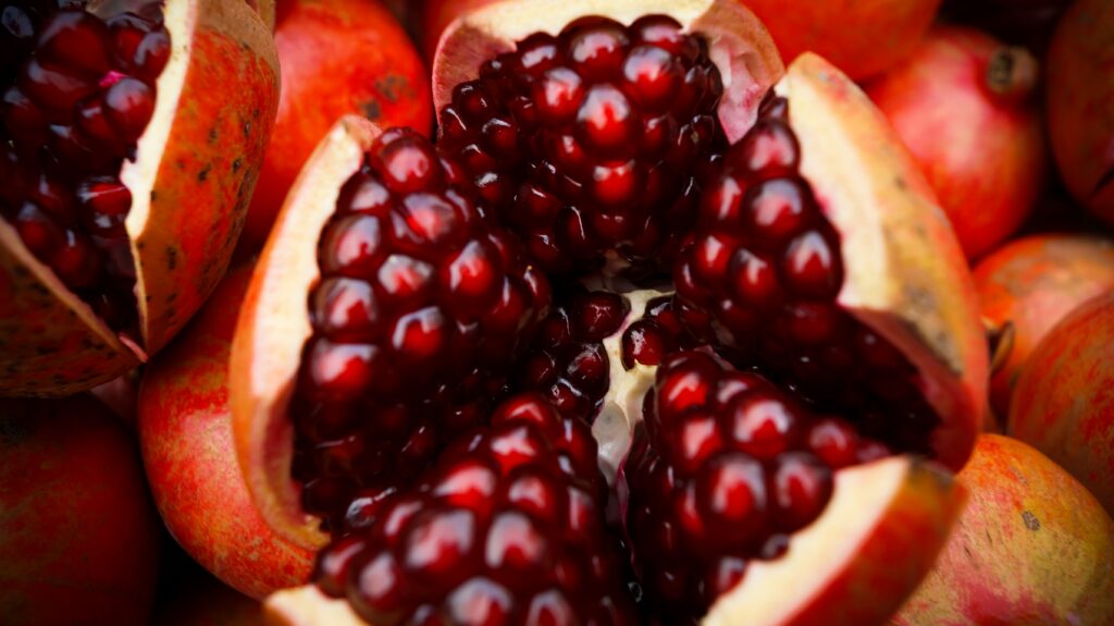 close-up photo of sliced pomegranate