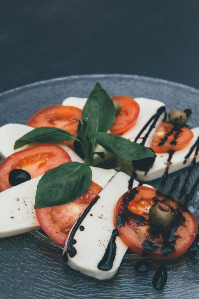 closeup photo of tofu and tomato slices